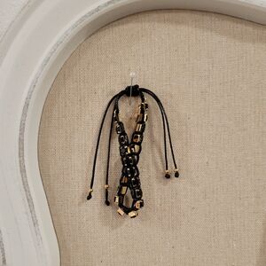 Tory Burch Black and Gold Slide Bracelet